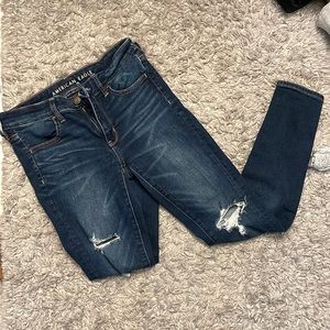 AE ripped dark wash jeans